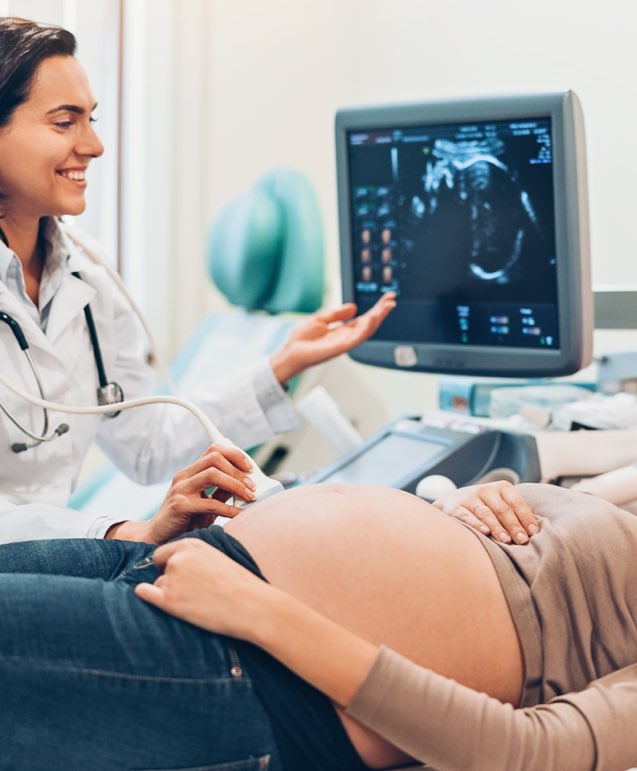 Pregnant woman watching her baby